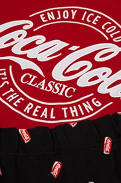 L&aring;ng pyjamas i bomull Coca-Cola&reg;-logotyp