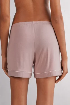 Shorts i modal med kontrasterande passpoal