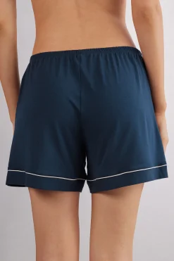 Shorts i modal med kontrasterande passpoal