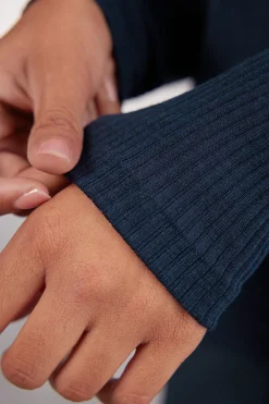 Tubular topp med l&aring;ng &auml;rm och h&ouml;g hals i ull och siden
