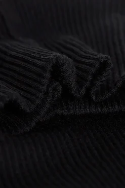 Tubular topp med l&aring;ng &auml;rm och h&ouml;g hals i ull och siden